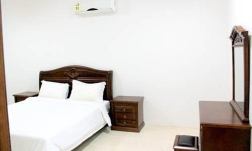 En eller flere senger på et rom på Al Fanar Palace 2
