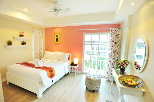 Кровать или кровати в номере The Beach Boutique House
