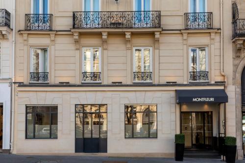 a store front of a building with windows at Montfleuri in Paris