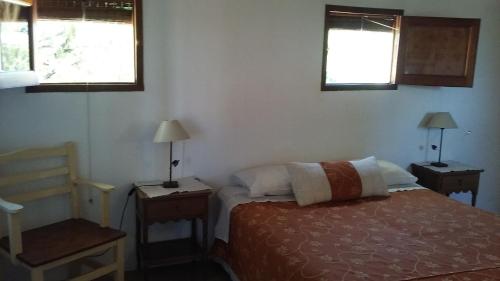 Tempat tidur dalam kamar di La Soleada