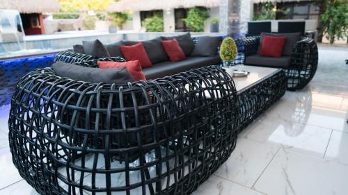 a living room with a couch and a table at Liberdada Villa SURINAME in Wanica