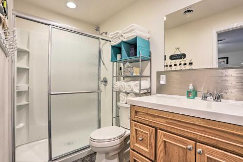 a bathroom with a shower and a toilet and a sink at Lake McConaughy Getaway with Covered Patio in Belmar