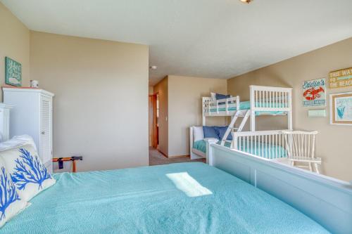 a bedroom with a bed and a bunk room at Hubbert Hideaway in Lincoln City