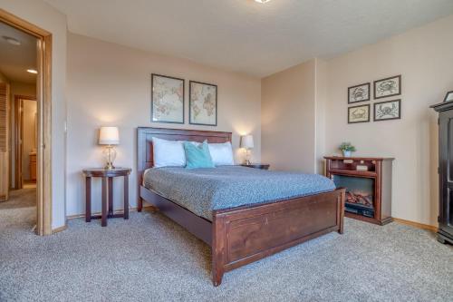 a bedroom with a bed and a fire place at Hubbert Hideaway in Lincoln City