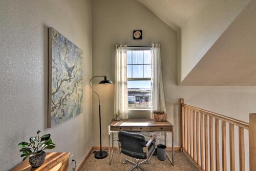 a home office with a desk and a window at 503 Mountain Loft with Views 1 Mi to Dwtn Fairplay! in Fairplay