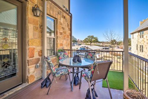 a patio with a table and chairs on a balcony at Pet-Friendly Townhome about 2 Mi to Town Square! in Georgetown