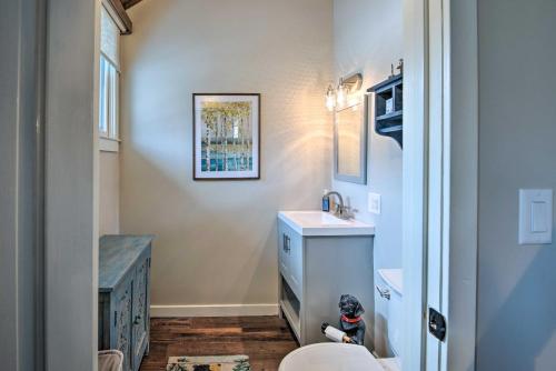 a bathroom with a sink and a toilet at Spacious Village of Loon Home Less Than 1 Mi to Ski Slopes in Lincoln
