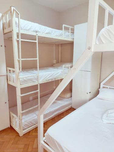 a bunk bed room with two bunk beds at Solar Hostel Beach Copacabana in Rio de Janeiro