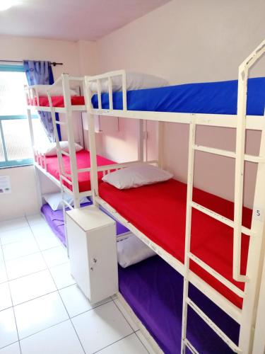 a bunk bed room with two bunk beds at Solar Hostel Beach Copacabana in Rio de Janeiro