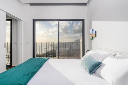 Ένα ή περισσότερα κρεβάτια σε δωμάτιο στο Relax View