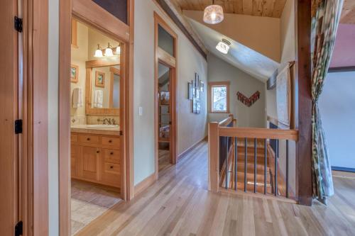 a home with a staircase leading to a bathroom at The Davenport - Meredith Lodging in Bend