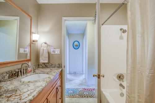 a bathroom with a sink and a shower at Casa de Navarro in Lincoln City