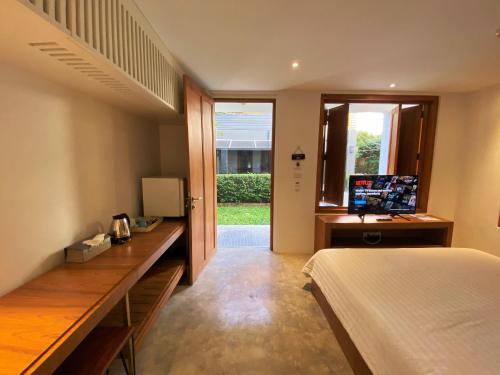 TV a/nebo společenská místnost v ubytování Vali Villa Bangkok