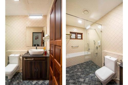 uma casa de banho com um WC, um lavatório e um chuveiro em StayVista at Springhills Villa & Ayurvedic Spa em Cochin