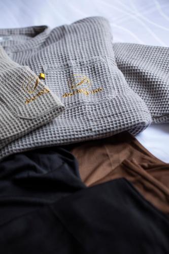 a close up of a dress shirt and a tie at Dormy Inn Premium Nagasaki Ekimae in Nagasaki