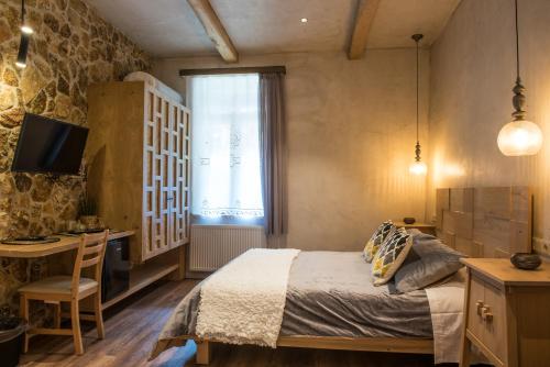 Cama o camas de una habitación en «Σκλάβας Χνάρι» Παραδοσιακός Ξενώνας