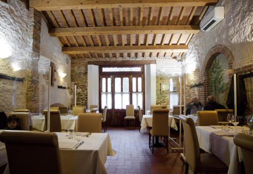En restaurang eller annat matställe på Modus Vivendi - Room E Relax