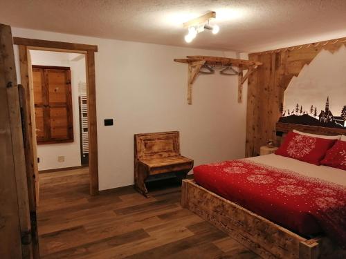 Ein Bett oder Betten in einem Zimmer der Unterkunft Maison Perriail Vda Gressan n 0029