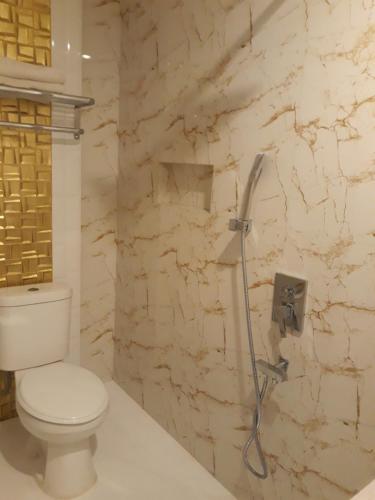 Koupelna v ubytování Alsalam Syariah Guesthouse
