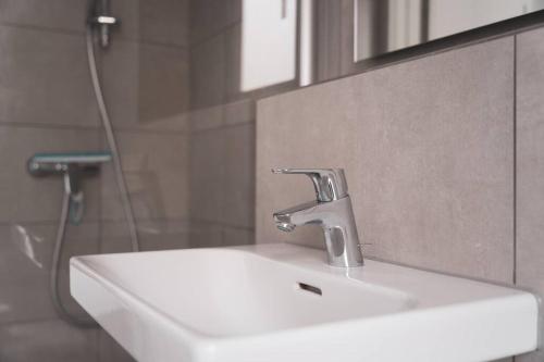 Koupelna v ubytování 150 m² Maisonnette Whg mit Galerie für 10 Personen