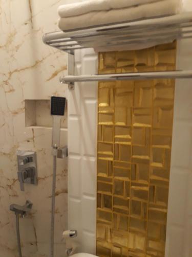 Ванная комната в Alsalam Syariah Guesthouse