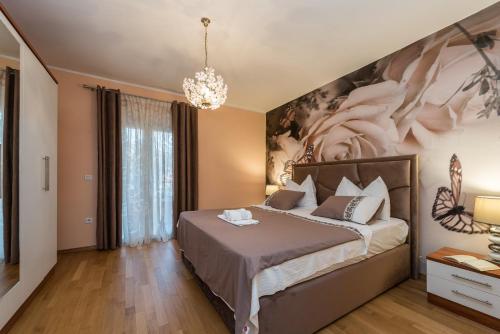 Ein Bett oder Betten in einem Zimmer der Unterkunft Villa Marko