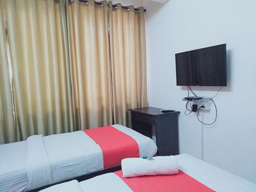Katil atau katil-katil dalam bilik di Happy Stay Service Apartment