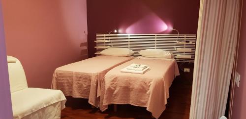 Кровать или кровати в номере Acquamarina