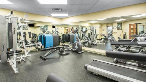 a gym with a lot of treadmills and machines at Bluegreen Vacations Christmas Mountain Village, an Ascend Collection Resort in Wisconsin Dells