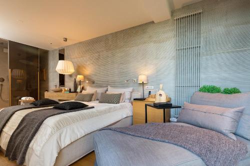 Posteľ alebo postele v izbe v ubytovaní Boutique Hotel Valsabbion