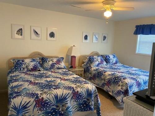 Postel nebo postele na pokoji v ubytování Due South