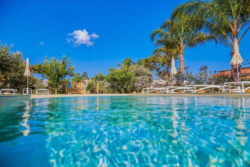 The swimming pool at or close to Residence I Faraglioni
