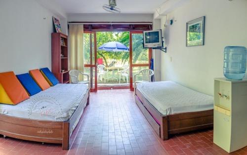 Ein Bett oder Betten in einem Zimmer der Unterkunft ALDEA VACACIONAL LA FLORIDA Apto 103 Bloque 1