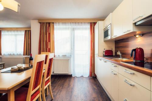 Cuisine ou kitchenette dans l'établissement Die Reblaus