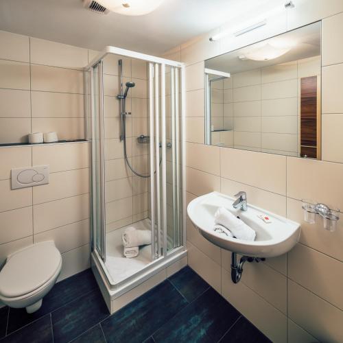 Salle de bains dans l'établissement Die Reblaus