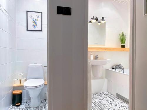 Kúpeľňa v ubytovaní Apartament Dzień Dobry 2