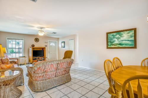 a living room with a couch and a table at Sapphire Sabbatical in Key West