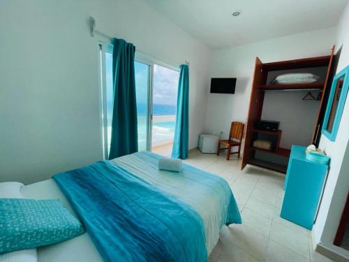 Postel nebo postele na pokoji v ubytování Habitación Amanecer Turquesa #5