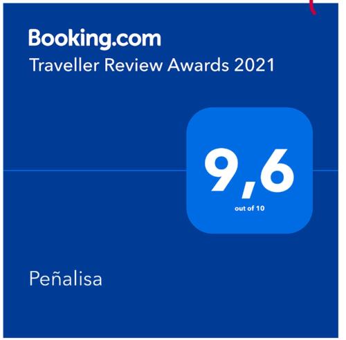 a screenshot of a phone with the travel review awards at PeñalisaKapoSalSar in Girardot