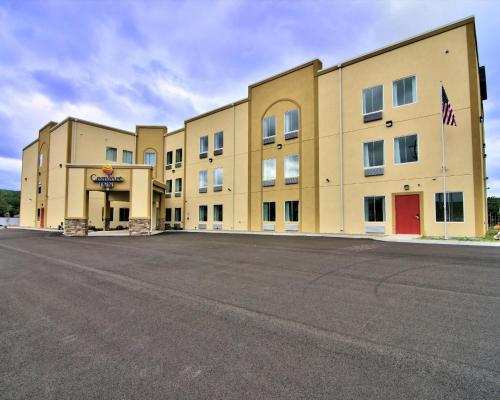 an empty parking lot in front of a hotel at Comfort Inn Apalachin - Binghamton W Route 17 in Apalachin