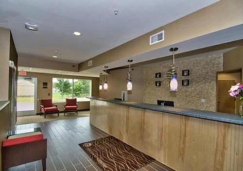 a lobby with a bar in a hospital at Comfort Inn Apalachin - Binghamton W Route 17 in Apalachin