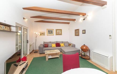 a living room with a couch and a table at House Mare in Kastel Novi