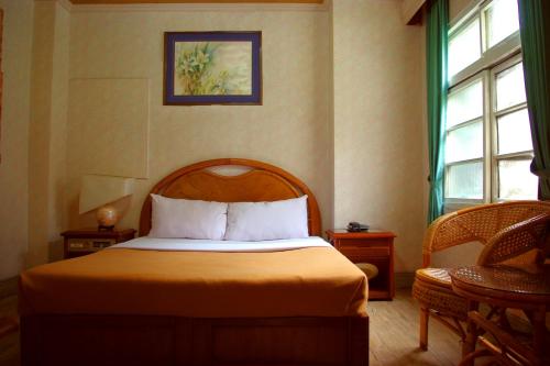 Voodi või voodid majutusasutuse Uni Hotel toas