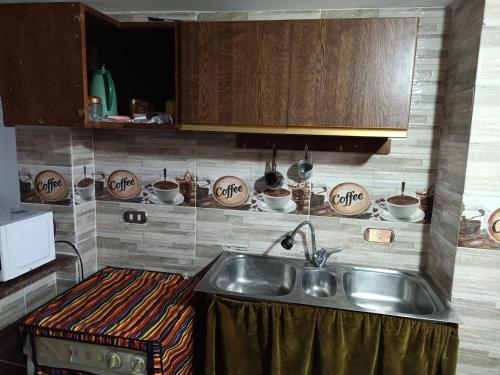 Kjøkken eller kjøkkenkrok på Chalet Palmera resort ain Sukhna-egypt