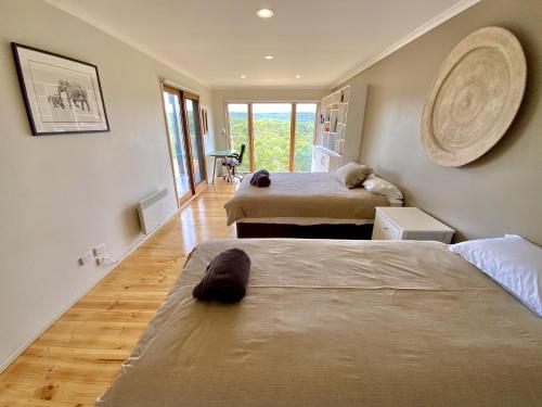 Voodi või voodid majutusasutuse The Views Cottage toas