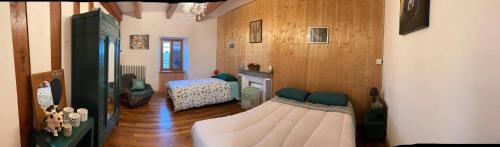 Giường trong phòng chung tại Horizon Aubrac Laguiole