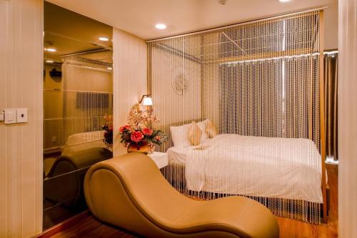 Ένα ή περισσότερα κρεβάτια σε δωμάτιο στο Hotel Diễm My