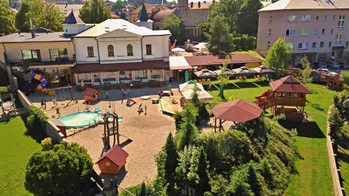 an aerial view of a park with a playground at Apartmány Bejby Turnov in Turnov