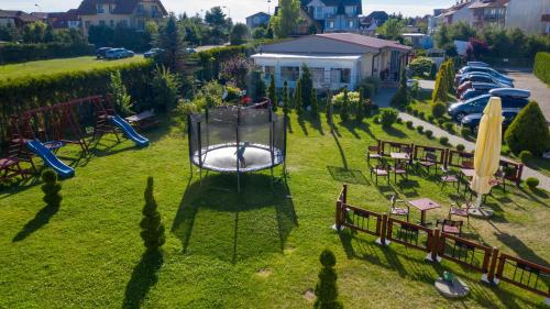 an aerial view of a park with a playground at Willa Rawia 2 in Rewal