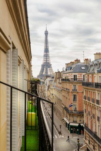 a view from a balcony of the eiffel tower at Elysées Union in Paris